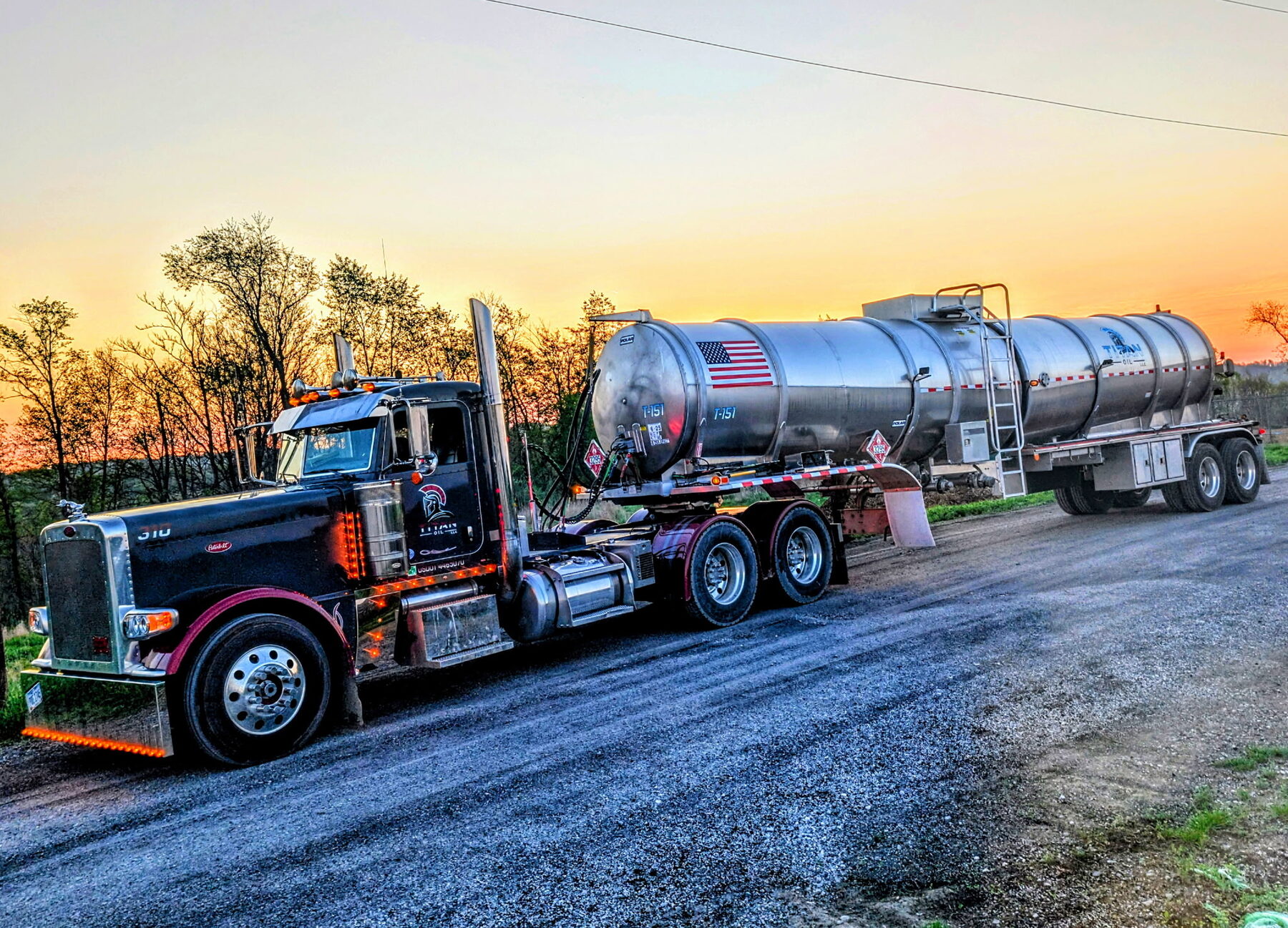 Titan Oil truck 310 at sunset on a country road